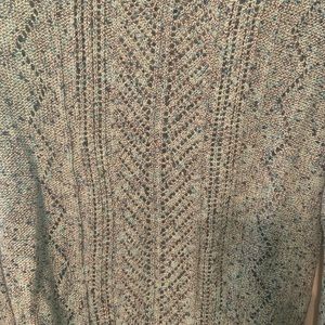 Light weight sweater. Blues,teal,white multi. Never worn.